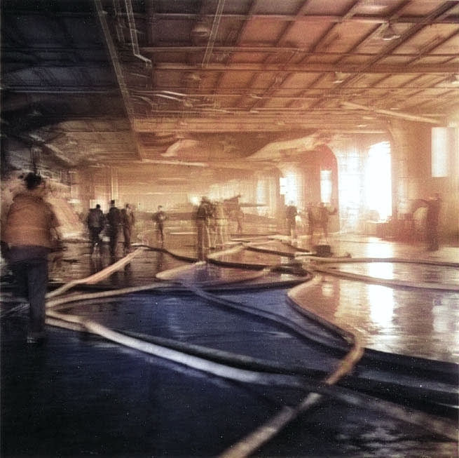 Yorktown's hangar deck just after fire was extinguished, 4 Jun 1942; note the TBD-1 torpedo bomber hanging overhead [Colorized by WW2DB]