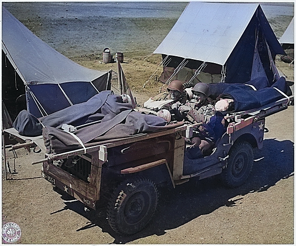 An improvised jeep ambulance at a training camp in Camp Carson, Colorado, United States, 24 Apr 1943 [Colorized by WW2DB]