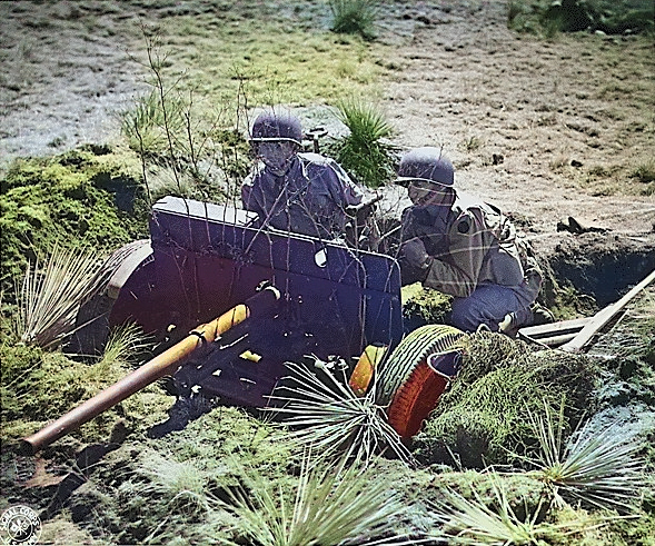 37 mm Gun M3 and crew in exercise, Camp Carson, Colorado, United States, 24 Apr 1943 [Colorized by WW2DB]