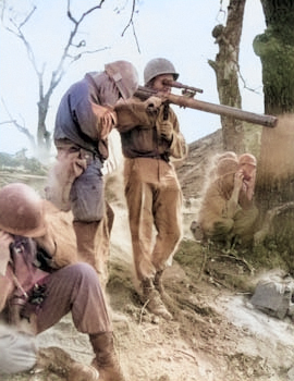 Man of 9th Infantry, US 2nd Infantry Division firing a M18A1 recoilless gun, Korea, 5 Sep 1951 [Colorized by WW2DB]