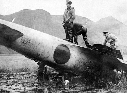 US military personnel inspecting the 'Akutan Zero' wreck, Akutan Island, US Territory of Alaska, 11 Jul 1942, photo 1 of 3