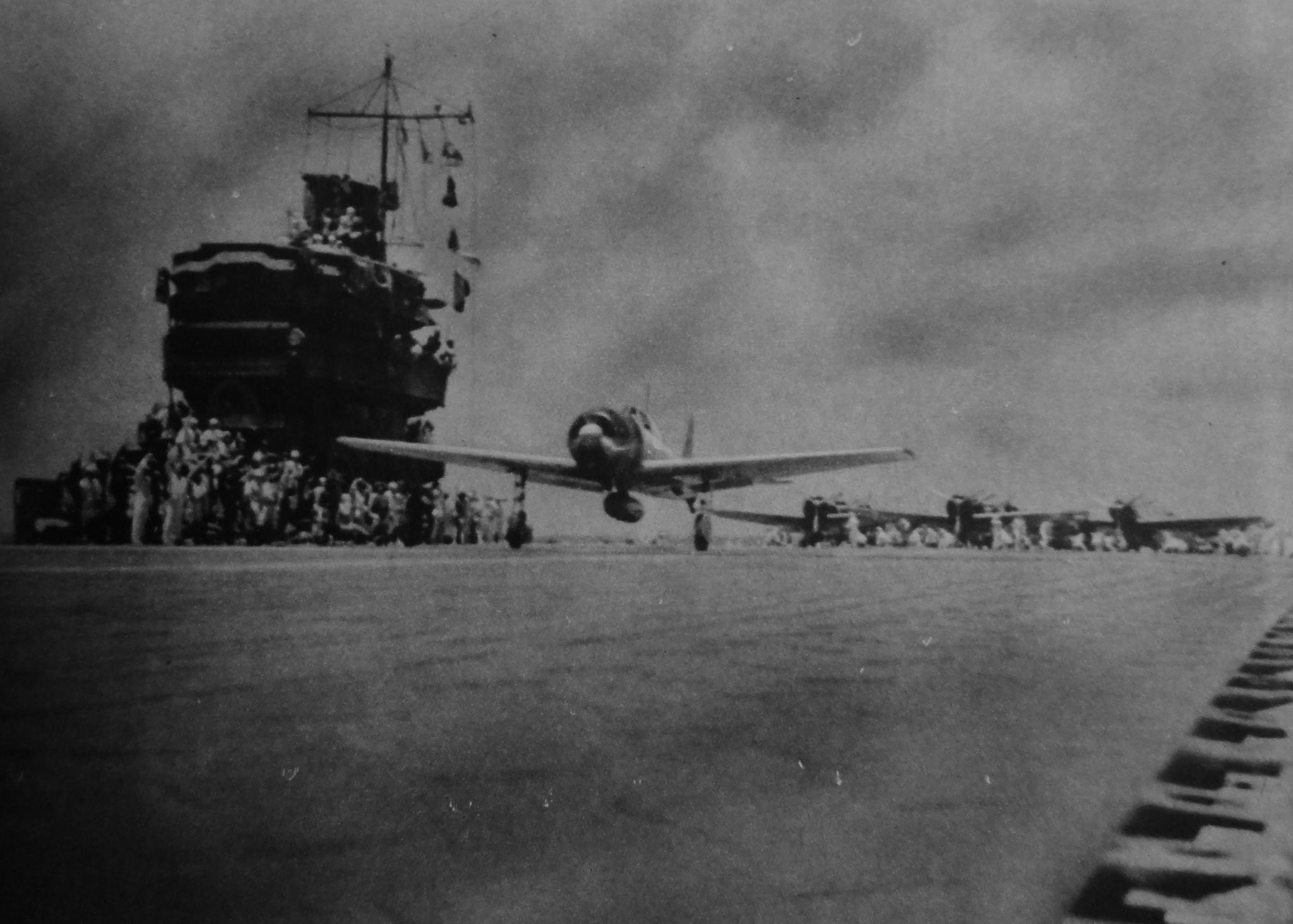 A6M Zero fighter taking off from a carrier, possibly Shokaku, 1941-1943