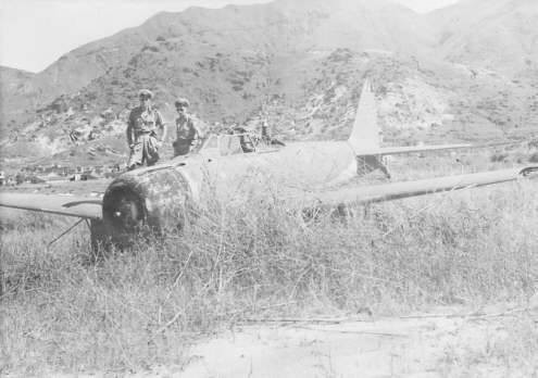 Abandoned Zero fighter, Kai Tak Airport, Hong Kong, 1945