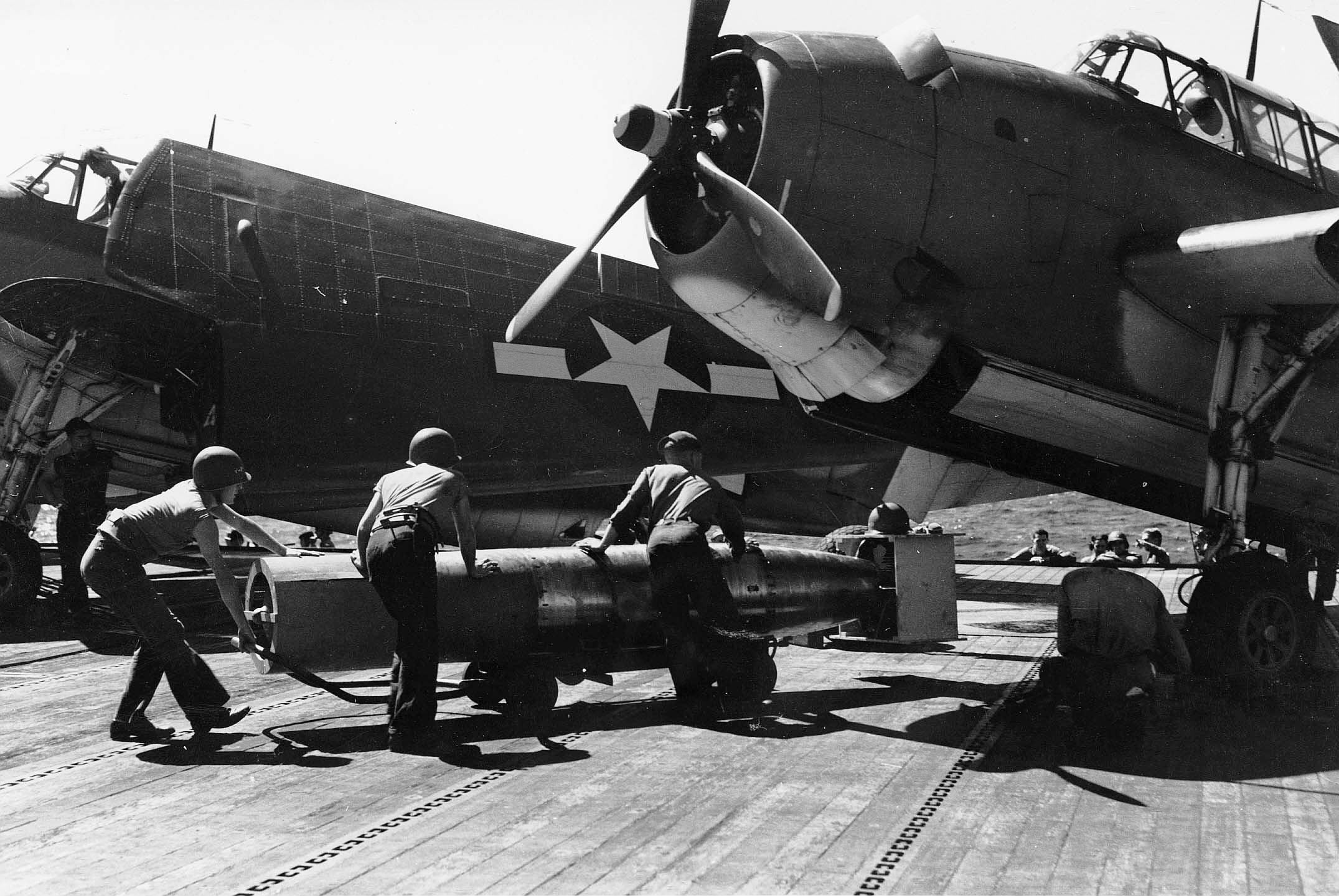 San Jacinto's VT-51 Avenger aircraft being armed with a Mark XIII torpedo for Battle off Cape Engaño, 25 Oct 1944