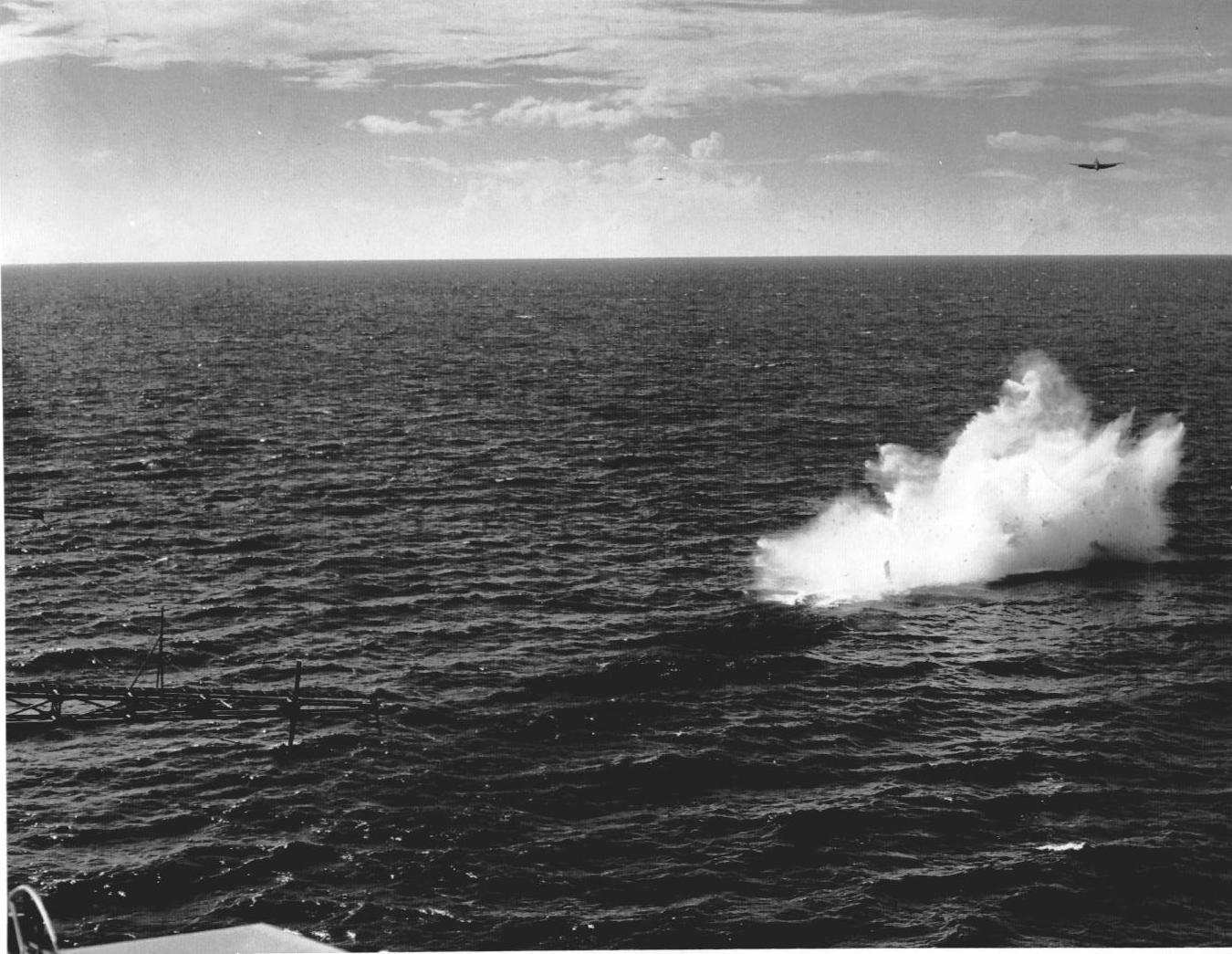 US Navy pilot Lt (jg) C. Clifton Francom unsuccessfully testing TBM Avenger torpedo bomber with experimental wing mounted radome aboard Ticonderoga, 4 Jul 1944, photo 3 of 5