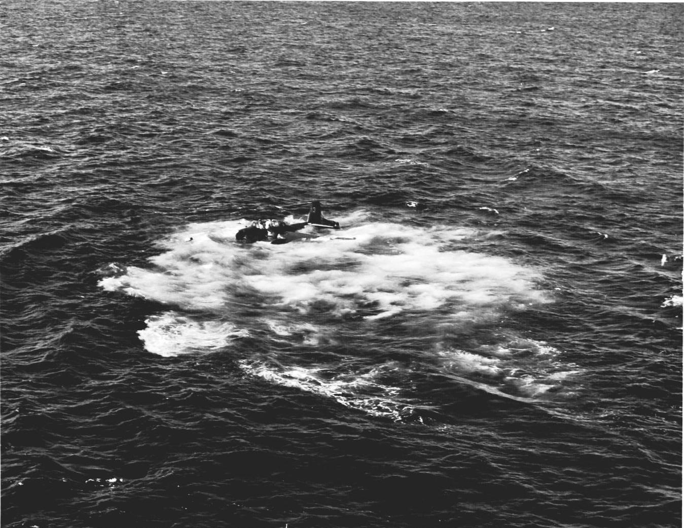 US Navy pilot Lt (jg) C. Clifton Francom unsuccessfully testing TBM Avenger torpedo bomber with experimental wing mounted radome aboard Ticonderoga, 4 Jul 1944, photo 5 of 5