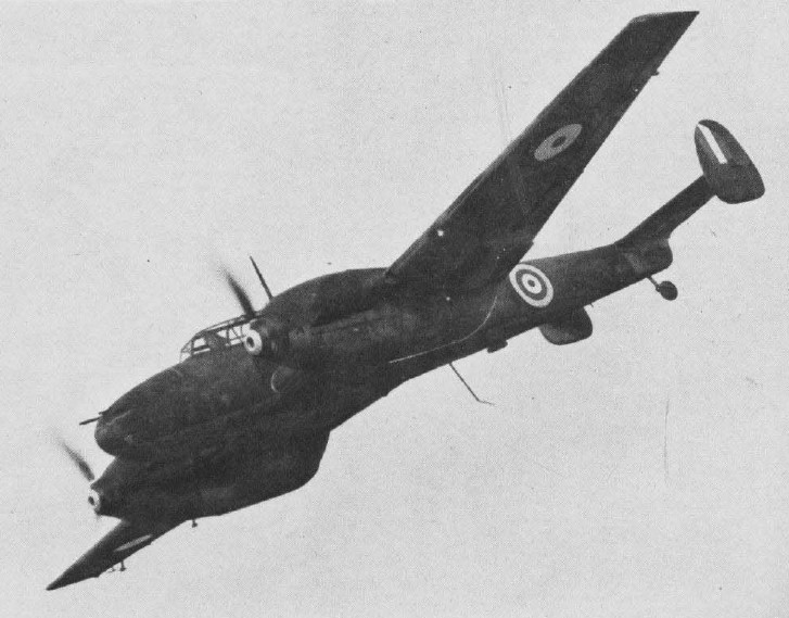 Captured German Bf 110 C-4 aircraft in flight over RAF Duxford, England, United Kingdom, 1941-1942, as seen in publication US Navy Naval Aviation News dated 13 Dec 1943