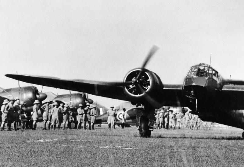 Blenheim Mark I bomber of No. 62 Squadron RAF and Buffalo fighters of Nos. 21 and 453 Squadrons RAAF on the ground, Sembawang, Singapore, late 1941, photo 1 of 2