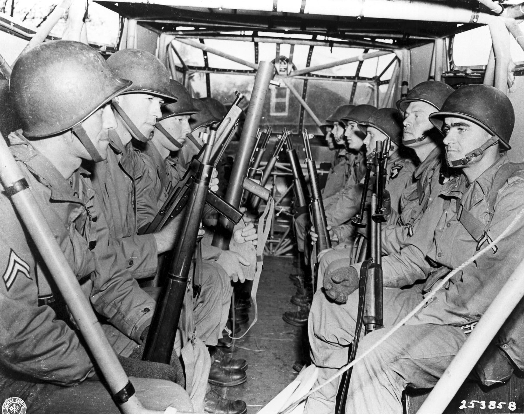 Waco CG-4 with US 101st Airborne men; note BAR, M1 Garand, Thompson M1A1, M1A1 Bazooka, Springfield 1903; possibly a training jump due to peeling PFC stripes; circa early 1944