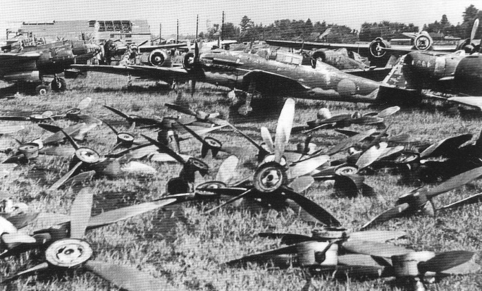 Japanese P1Y Ginga and D4Y Suisei aircraft at Atsugi Airfield, Japan, post-war; note some propellers removed to prevent unauthorized flights