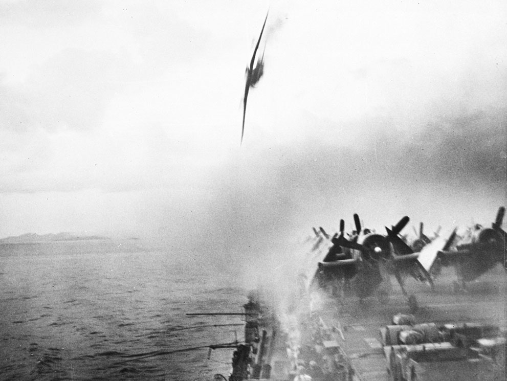 D4Y3 Suisei special attack aircraft diving at USS Sangamon as part of Operation Kikusui No. 5, off Kerama Retto, Ryukyu Islands, Japan, 4 May 1945