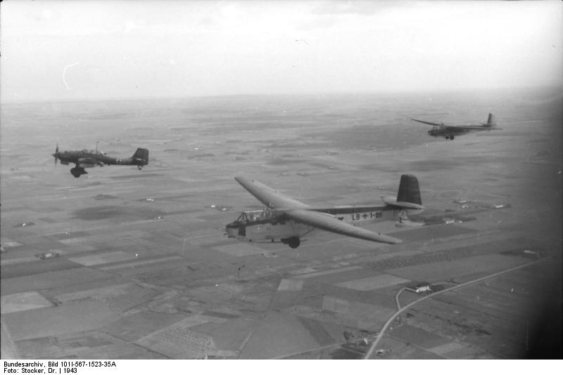 German Ju 87 Stuka dive bomber and DFS 230 gliders in flight over Italy, 1943
