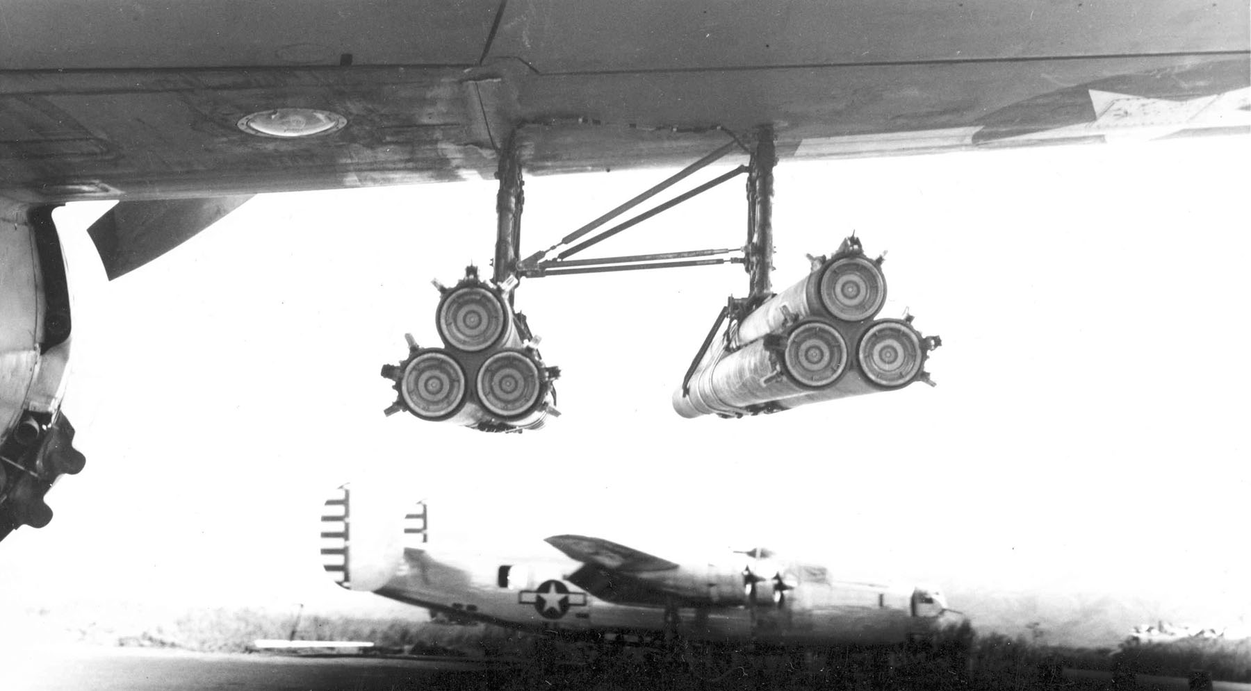 Close-up view of T30 rocket launchers mounted under the wing of an A-20 Havoc aircraft of 90th Attack Squadron, US 3rd Attack Group, Hollandia, New Guinea, mid-1944