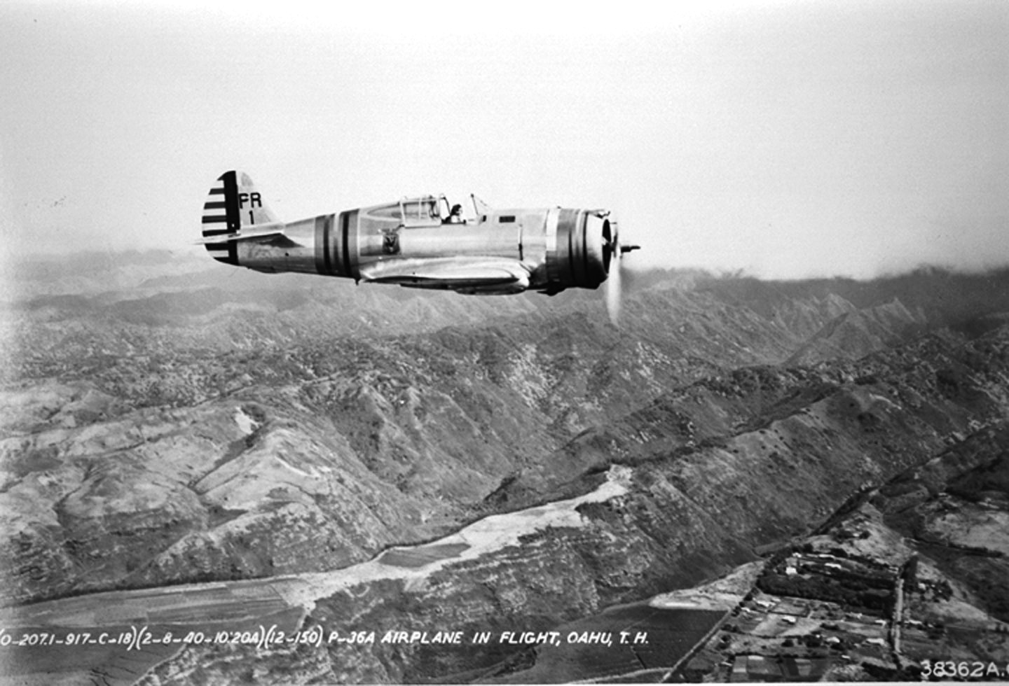 P-36 Hawk fighter based at Hickam Field in flight over Oahu, US Territory of Hawaii, 8 Feb 1940