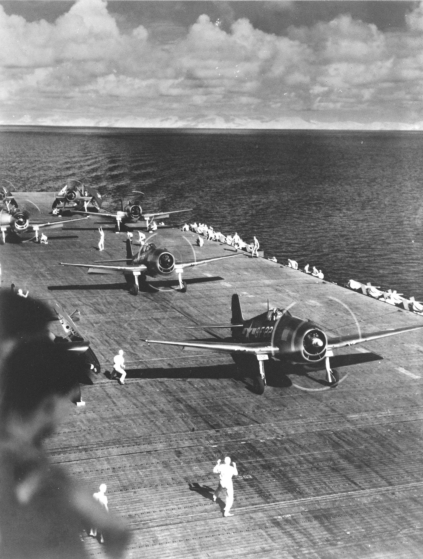F6F Hellcat aircraft of Fighting Squadron 8 warm up on USS Intrepid's flight deck, 1943, photo 2 of 2; probably during stateside shakedown training