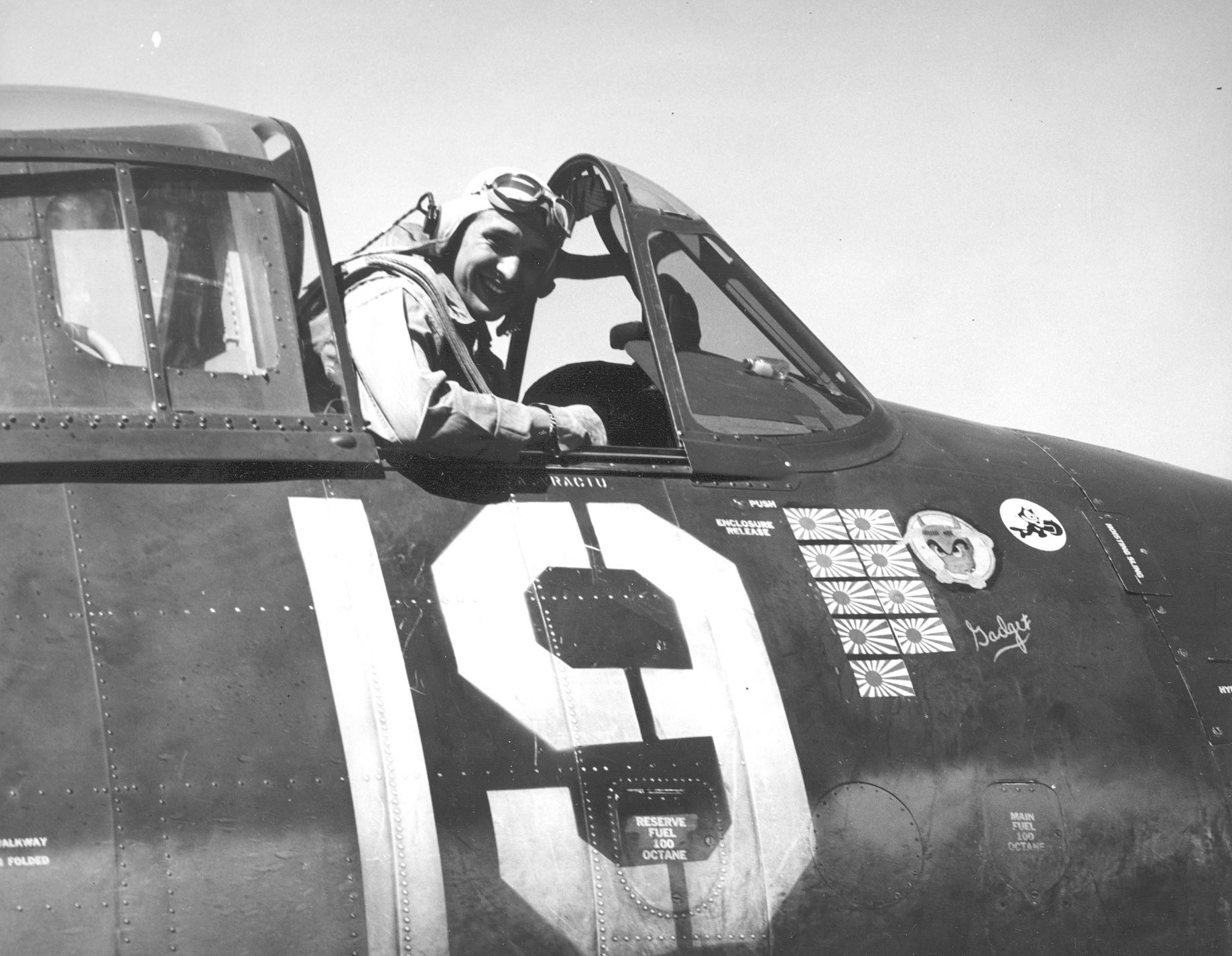 US Lt (jg) Alexander Vraciu of Fighting Squadron 6 in his F6F Hellcat 'Gadget' aboard USS Intrepid, 1944, photo 1 of 2; note markings for his first 9 kills