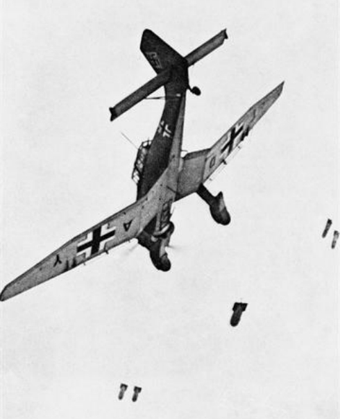 Ju 87B Stuka dive bomber of German Sturzkampffliegerschule 1 dropping bombs during training, circa 1940