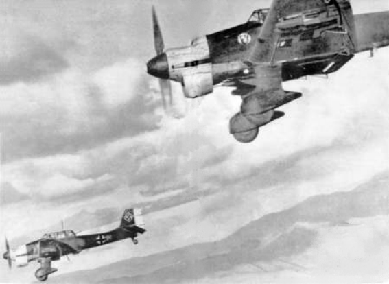 Two Ju 87B Stuka dive bombers in flight in the Balkans, 1941