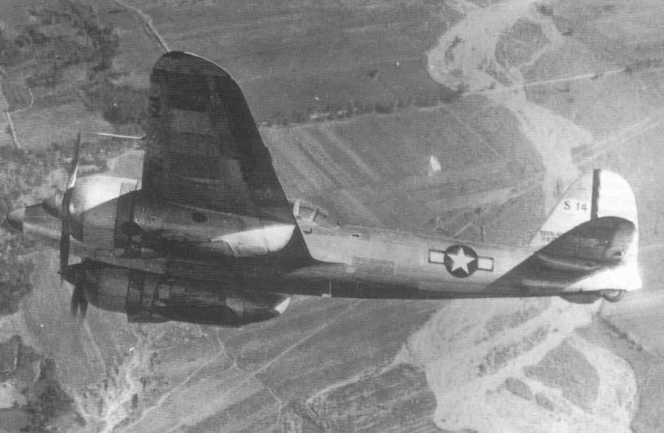 Captured Ki-45 aircraft with American markings in flight, date unknown, photo 2 of 3