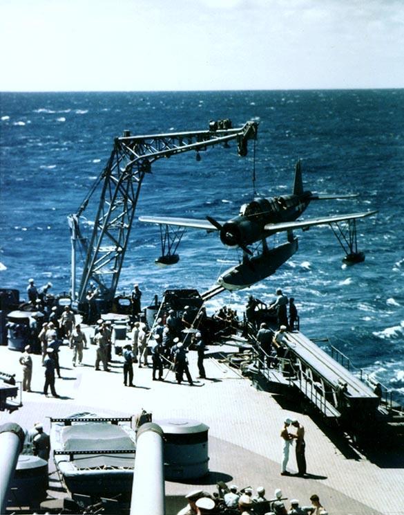 Crew of Battleship Missouri recovering an OS2U Kingfisher aircraft, circa Aug 1944