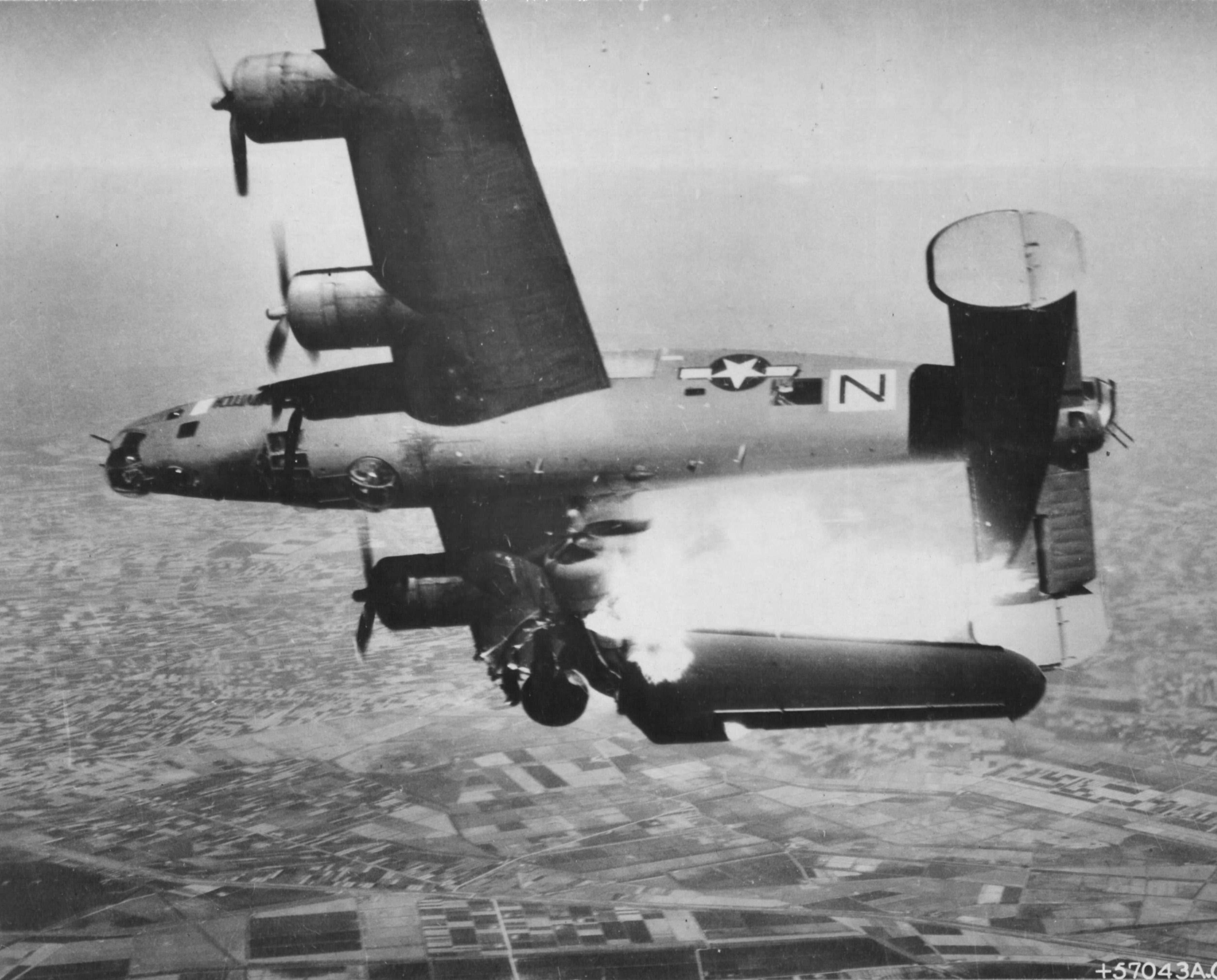 B-24L 'Stevonovitch II' of the of the 464th Bomber Group hit by German anti-aircraft fire over Lugo, Italy, 10 Apr 1945; out of the crew of 10 only 1, the bombardier, survived.