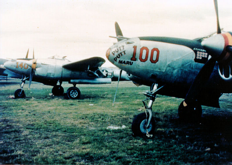 P-38 Lightning aircraft of the US 475th Fighter Group, South Pacific, 1944; note name 'Putt Putt Maru' on foreground fighter