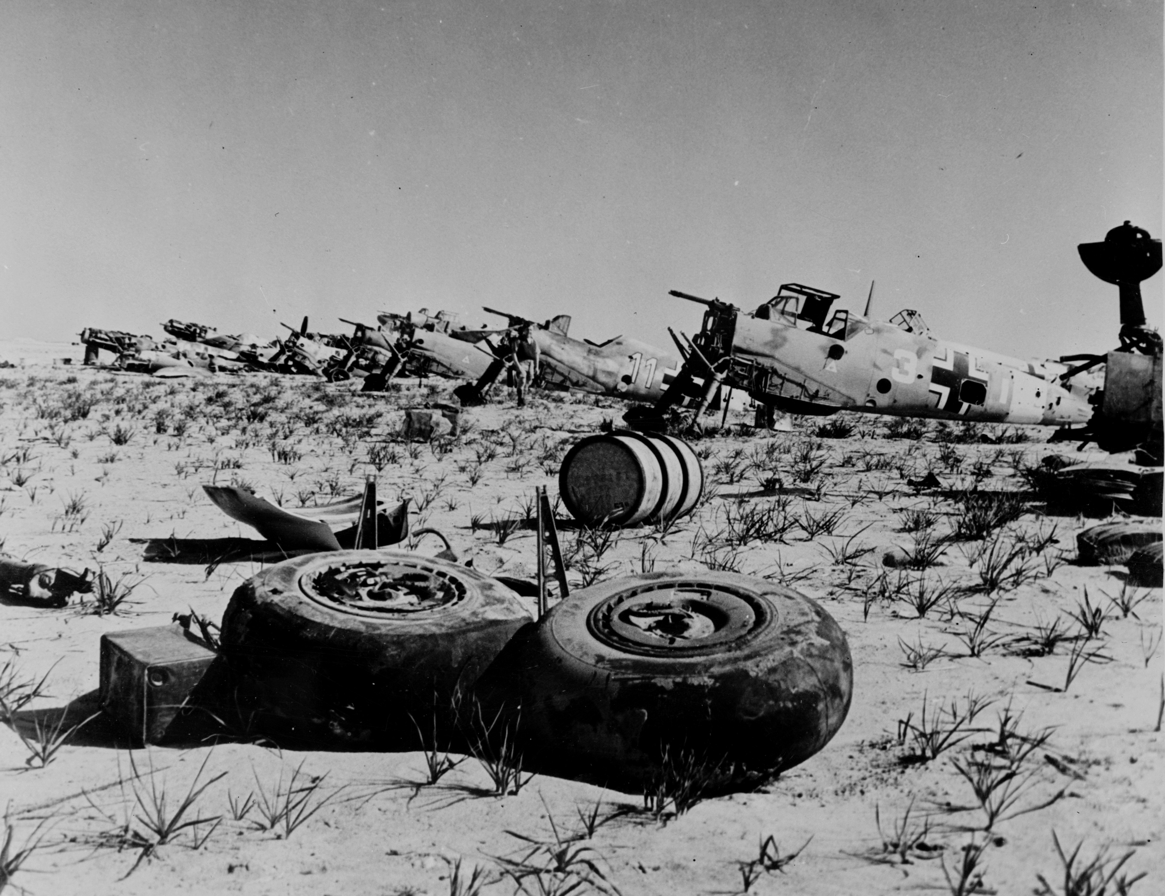 Eight wrecked Bf 109 fighters, North Africa, 1942