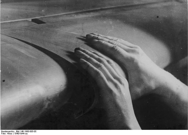 German factory worker putting together the wing of a Bf 109 fighter, 1940-1944