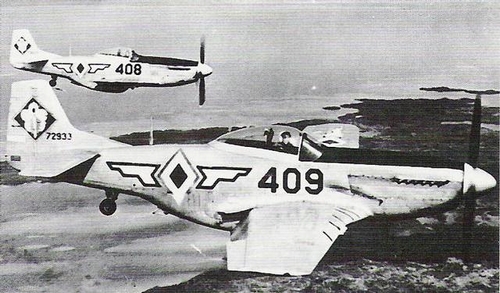 P-51 Mustang fighters of the Philippine Air Force in flight over the Philippines, circa 1950s