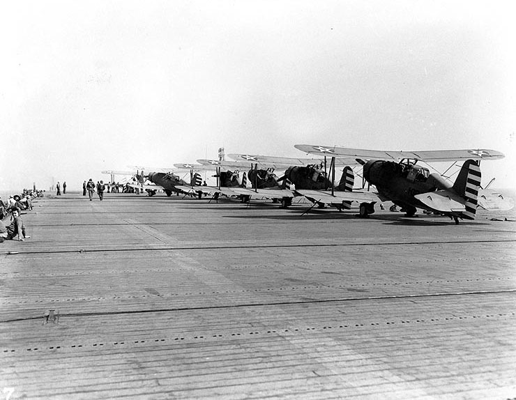 SOC-3A Seagull aircraft of VGS-1 parked on the flight deck of escort carrier Long Island, 10 May 1942