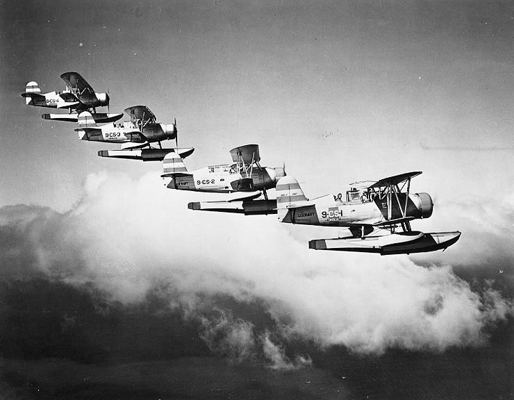 SOC-3 scout-observation floatplanes off cruiser Honolulu flying in formation, circa 1938-1939