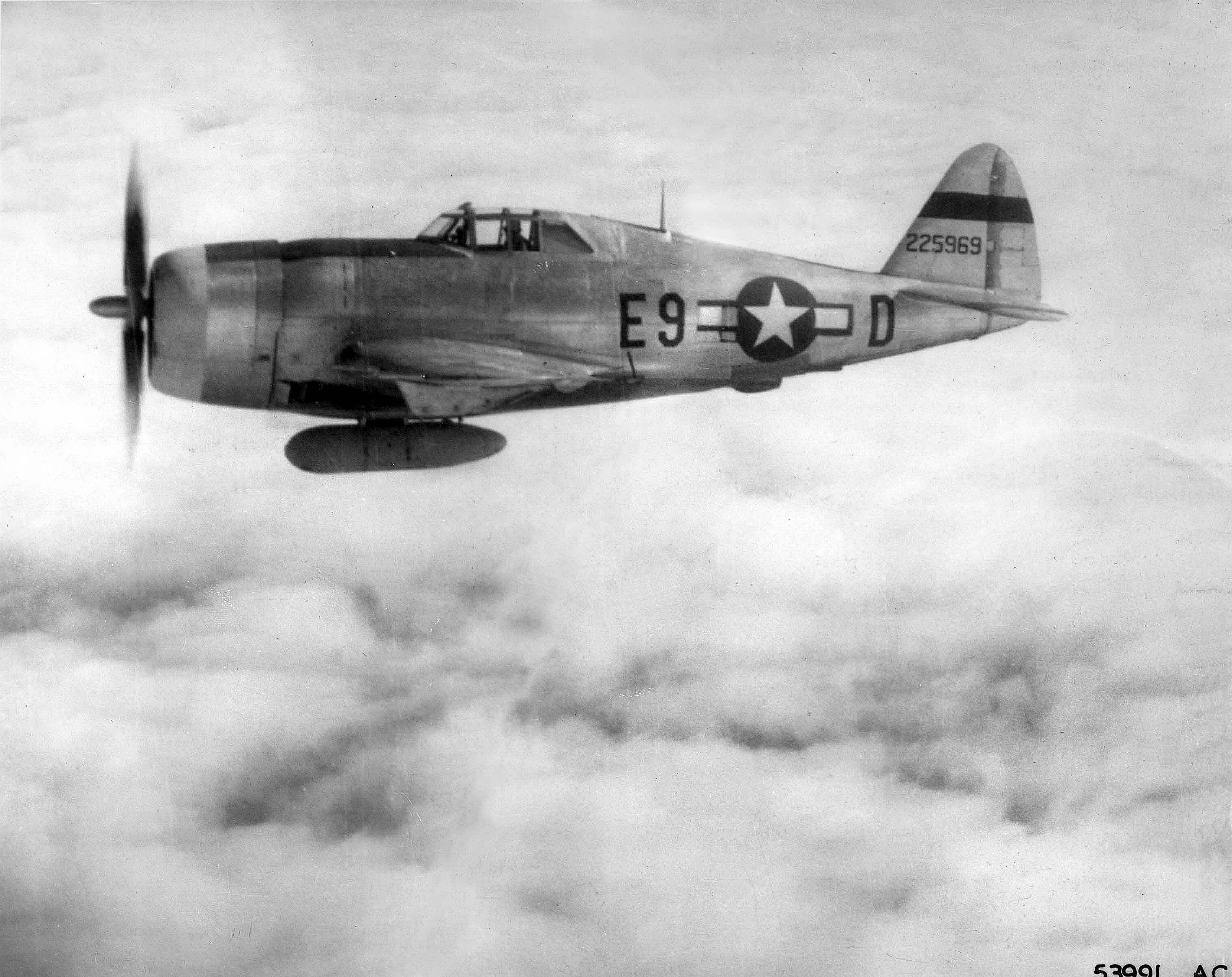 361st Fighter Group, 376th Fighter Squadron, US 8th Air Force Captain John D. Duncan's P-47D Thunderbolt fighter in flight over RAF Little Walden, England, United Kingdom, mid-1944