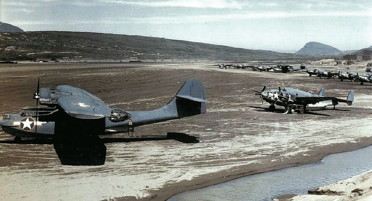US Navy PV-1 Ventura aircraft of Bombing Squadron VB-135 and PBY-5A Catalina from another squadron at the Adak Island airfield, Aleutian Islands, US Territory of Alaska, summer 1943