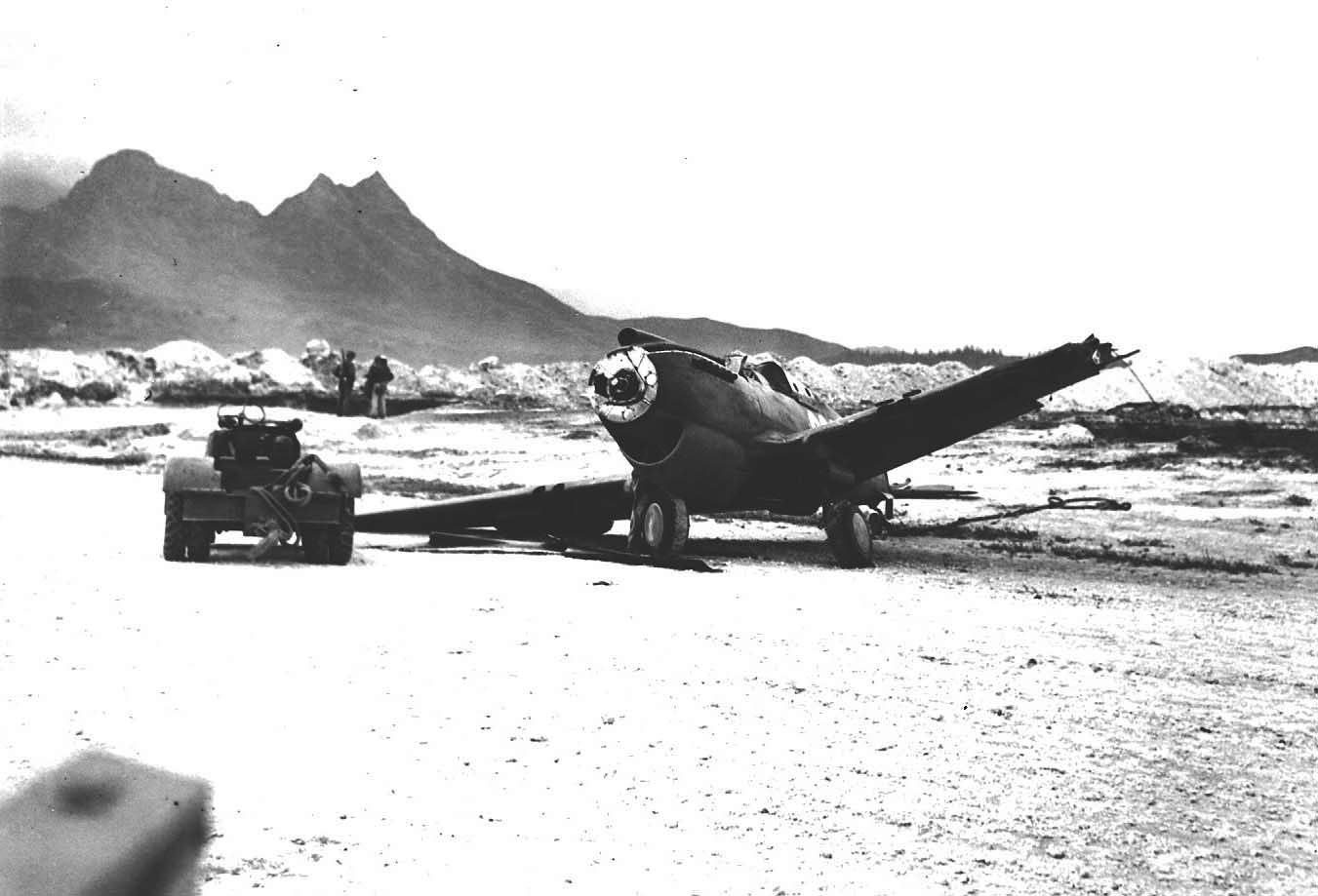 P-40 Warhawk aircraft damaged in a taxiing accident with another P-40 at Bellows Field, Oahu, US Territory of Hawaii, 8 Dec 1941, photo 2 of 3
