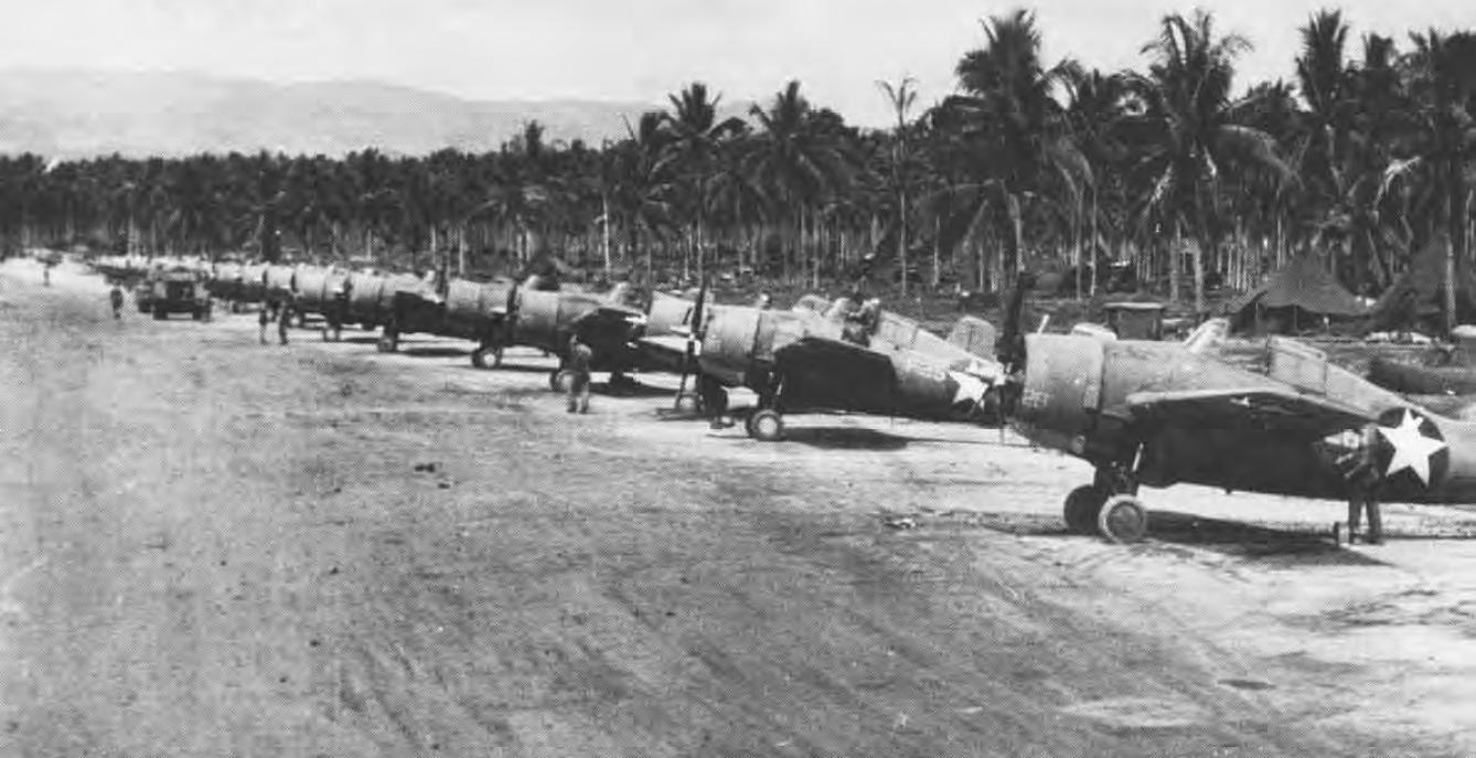 F4F Wildcat fighters of the US Navy and US Marines lined up on Henderson Field on Guadalcanal, Solomon Islands, Jan 1943, photo 1 of 2