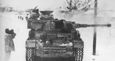 A Panzer IV stopped to look for Russian movement, Kharkov, May 1942