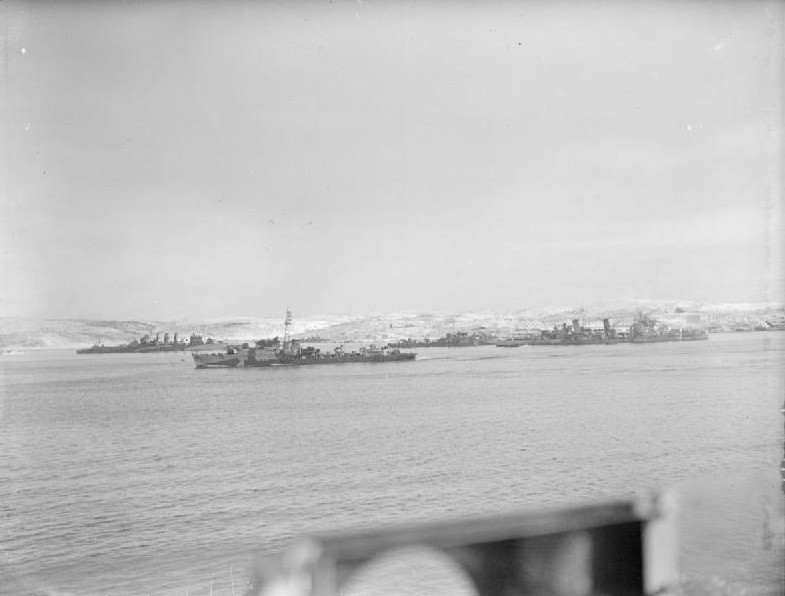 HMS Cumberland (left), HMS Obdurate (second from left), HMS Belfast (third from left), and HMS Faulknor (right) in the Kola Inlet near Murmansk, Russia, 27-28 Feb 1943