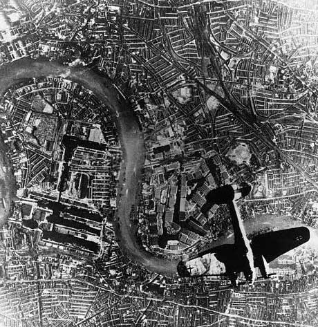 German He 111 bomber in flight northbound over Surrey Docks, London, England, United Kingdom at 1700 hours on 7 Sep 1940, photo 1 of 2