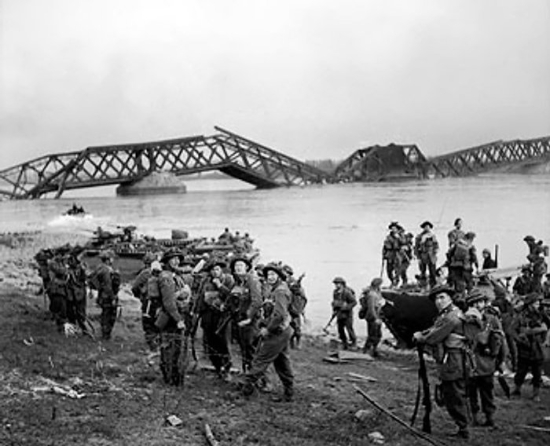 Men of the UK 1st Cheshire Regiment crossing the Rhine River with Buffalo tracked landing vehicles at Wesel, North Rhine-Westphalia, Germany, 24 Mar 1945