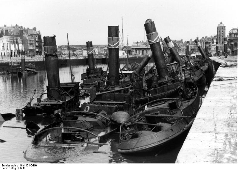 Destroyed boats in a northern French harbor, 1940