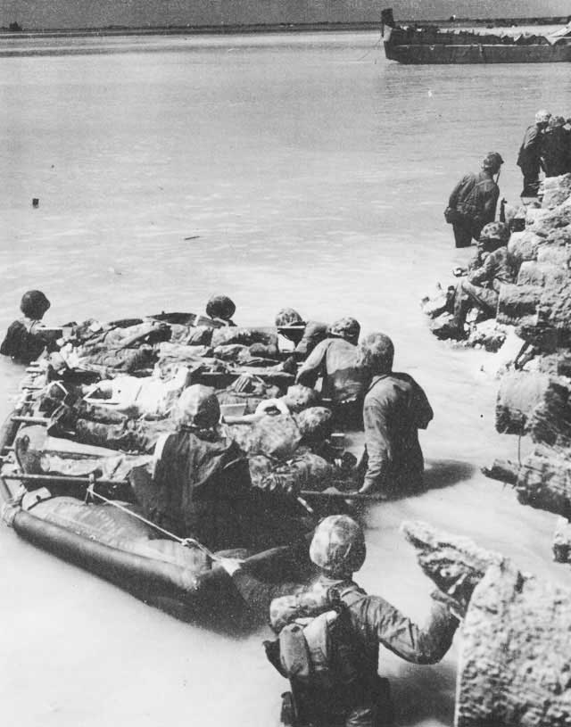 Casualties evacuated by rubber boat, Betio, Tarawa Atoll, 21 Nov 1943