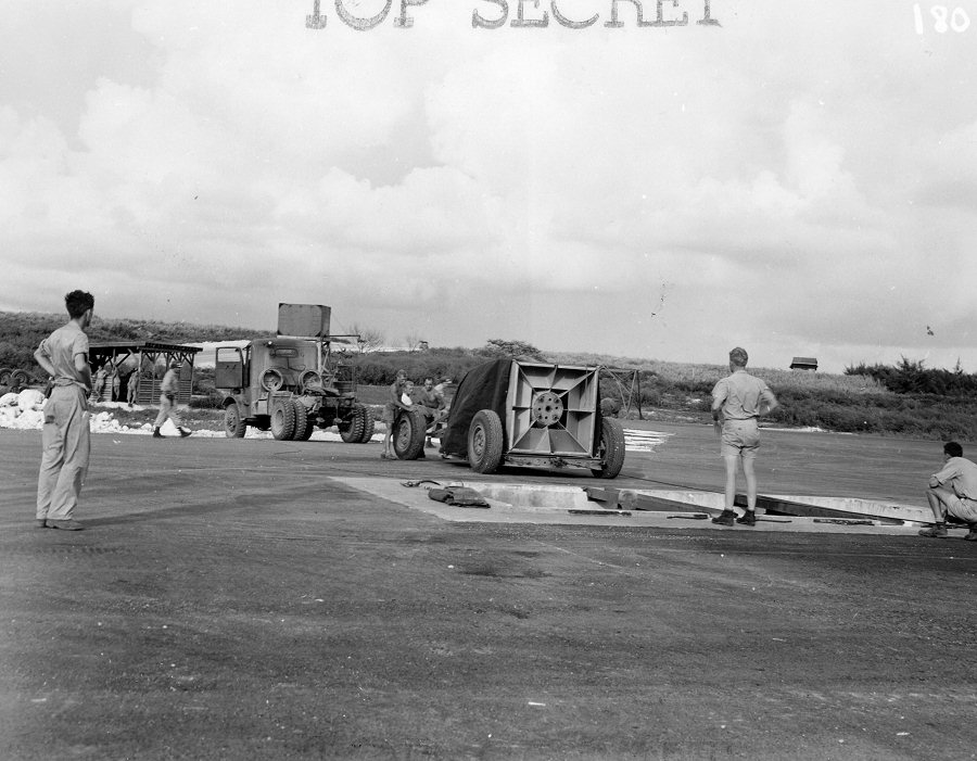 'Fat Man' bomb arriving at the airfield on Tinian, Mariana Islands, Aug 1945, photo 2 of 2