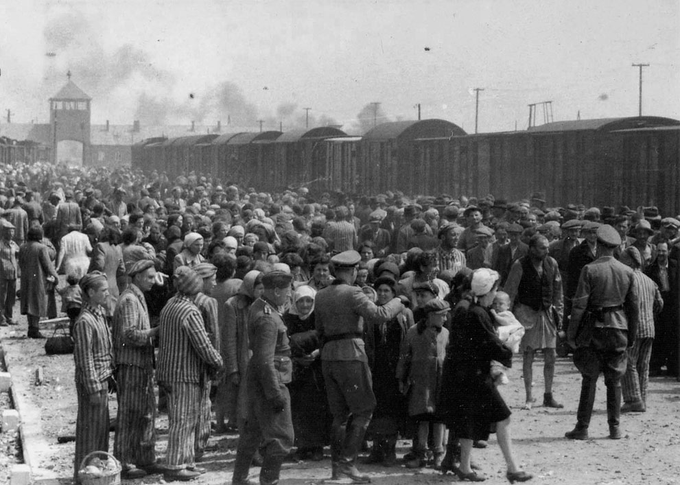 Carpatho-Ruthenian Jews being processed upon arrival at Auschwitz-Birkenau camp, Poland, May 1944