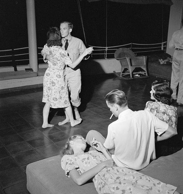 US Navy pilots on leave dancing with their dates at the Chris Holmes Rest Home in Hawaii, Mar 1944
