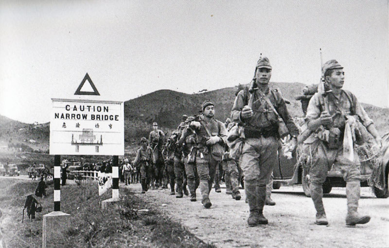 Japanese troops marching in Hong Kong, mid-Dec 1941