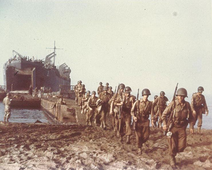 LST-1 landing troops onto a beach near Salerno, Italy, Sep 1943