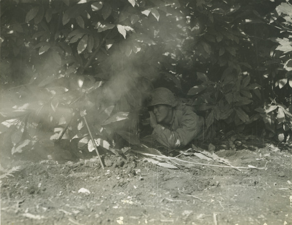 Japanese-American BAR gunner of US 100th Infantry Battalion taking position during mock maneuvers, Italy, 12 Oct 1943