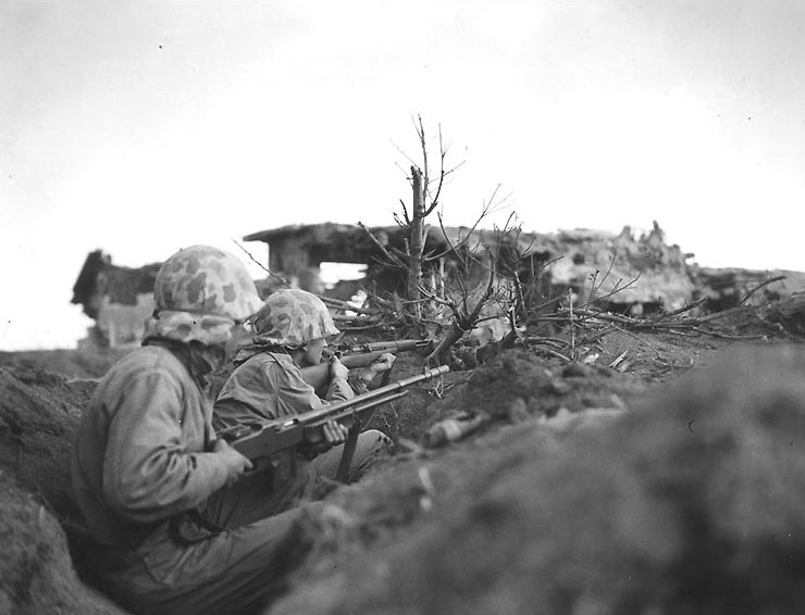 Private First Class John J. Helus (with BAR) and Corporal John A. Hicks (with M1), Iwo Jima, Japan, circa Feb-Mar 1945
