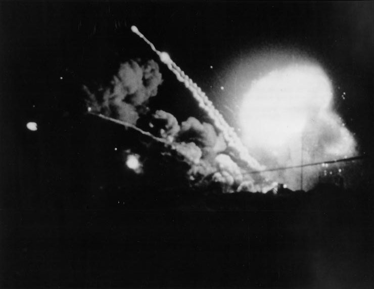An American ammunition dump exploded after being hit by Japanese artillery, Iwo Jima, Feb 1945