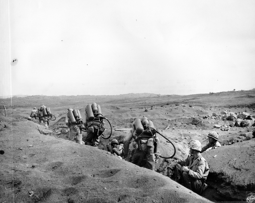 Flamethrowers of US 5th Marine Division advancing on Iwo Jima, Japan, 1945